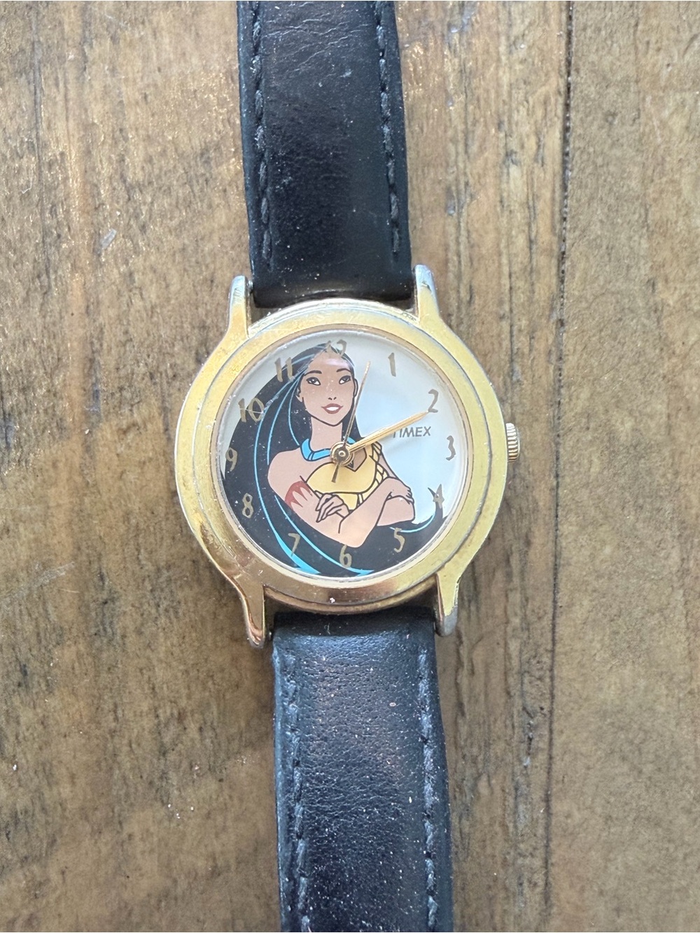 1990s Timex Women’s Gold-Tone Pocahontas Character Watch with Black Strap